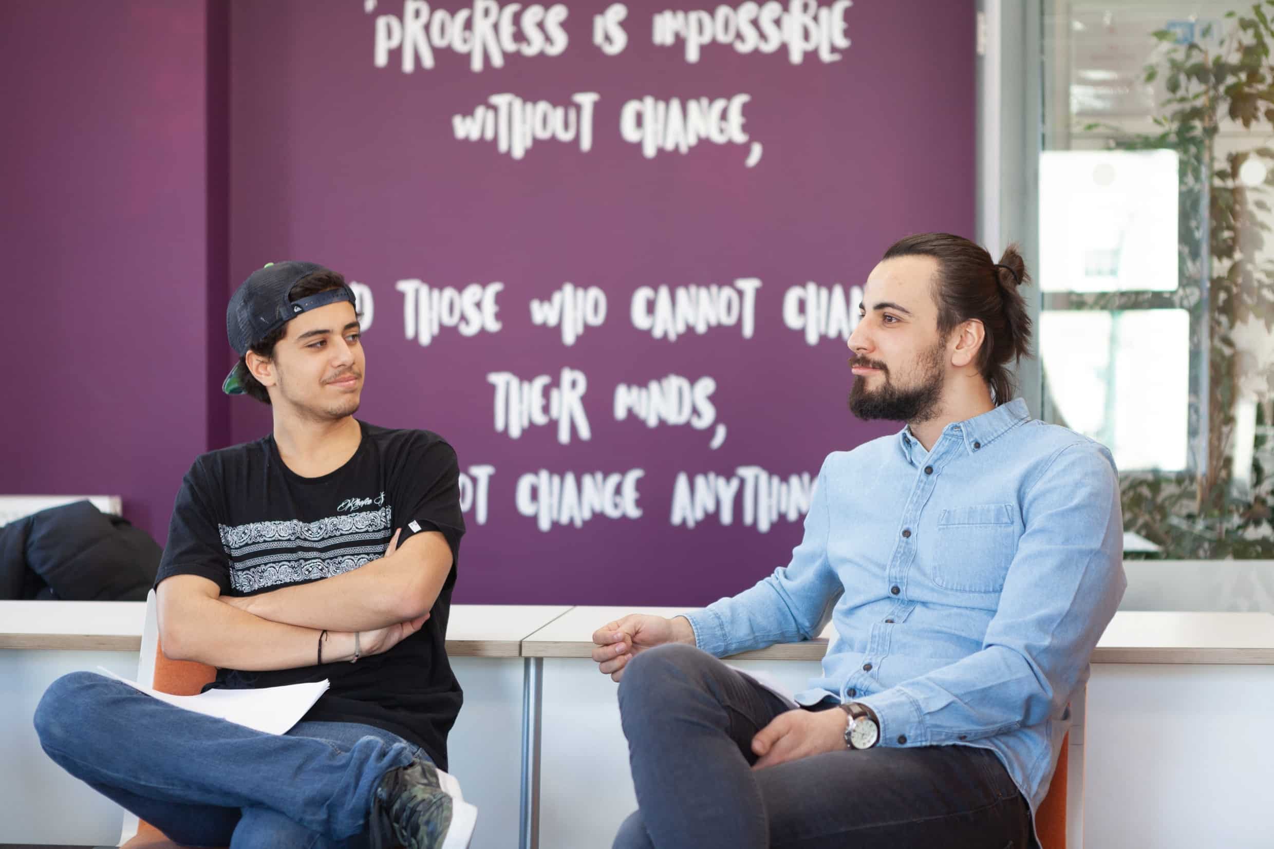 Ec dublin two students discussing in class