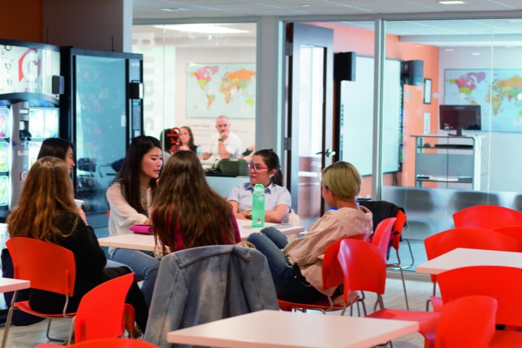 Ec boston students outside chatting